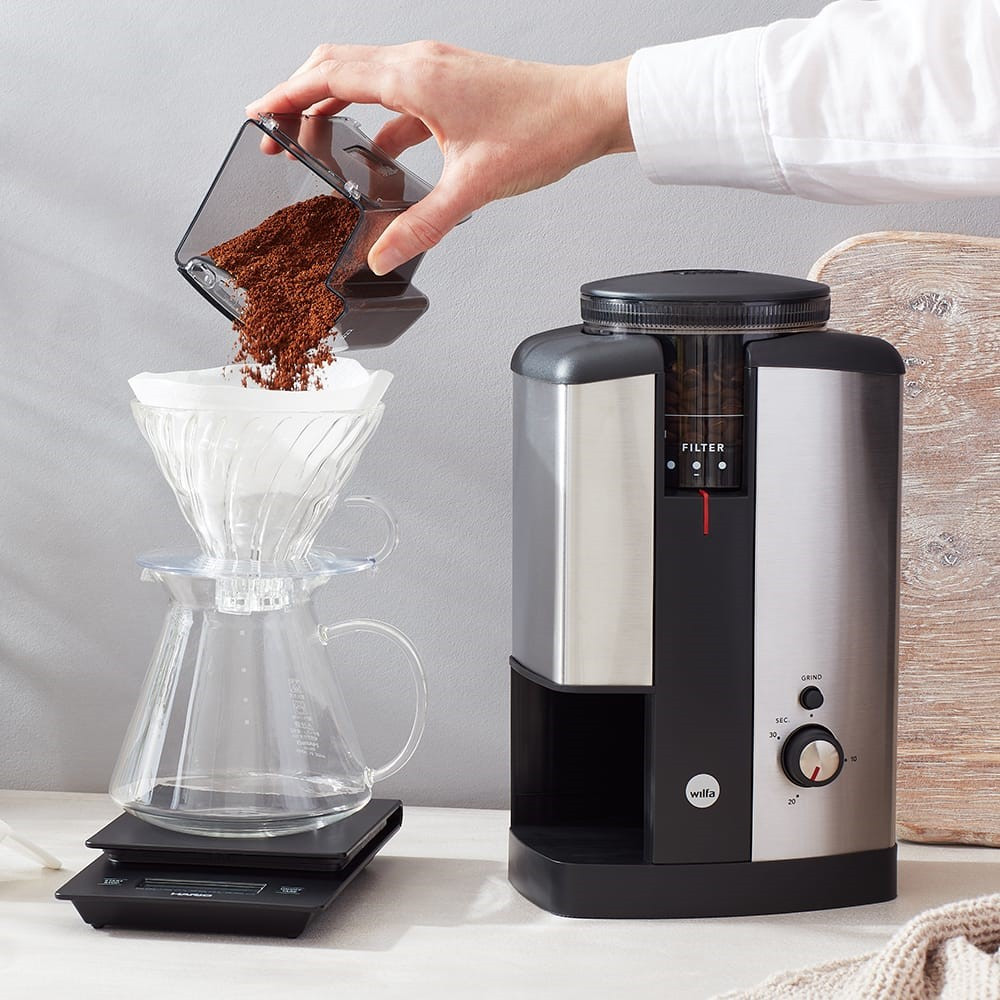Wilfer coffee grinder being used